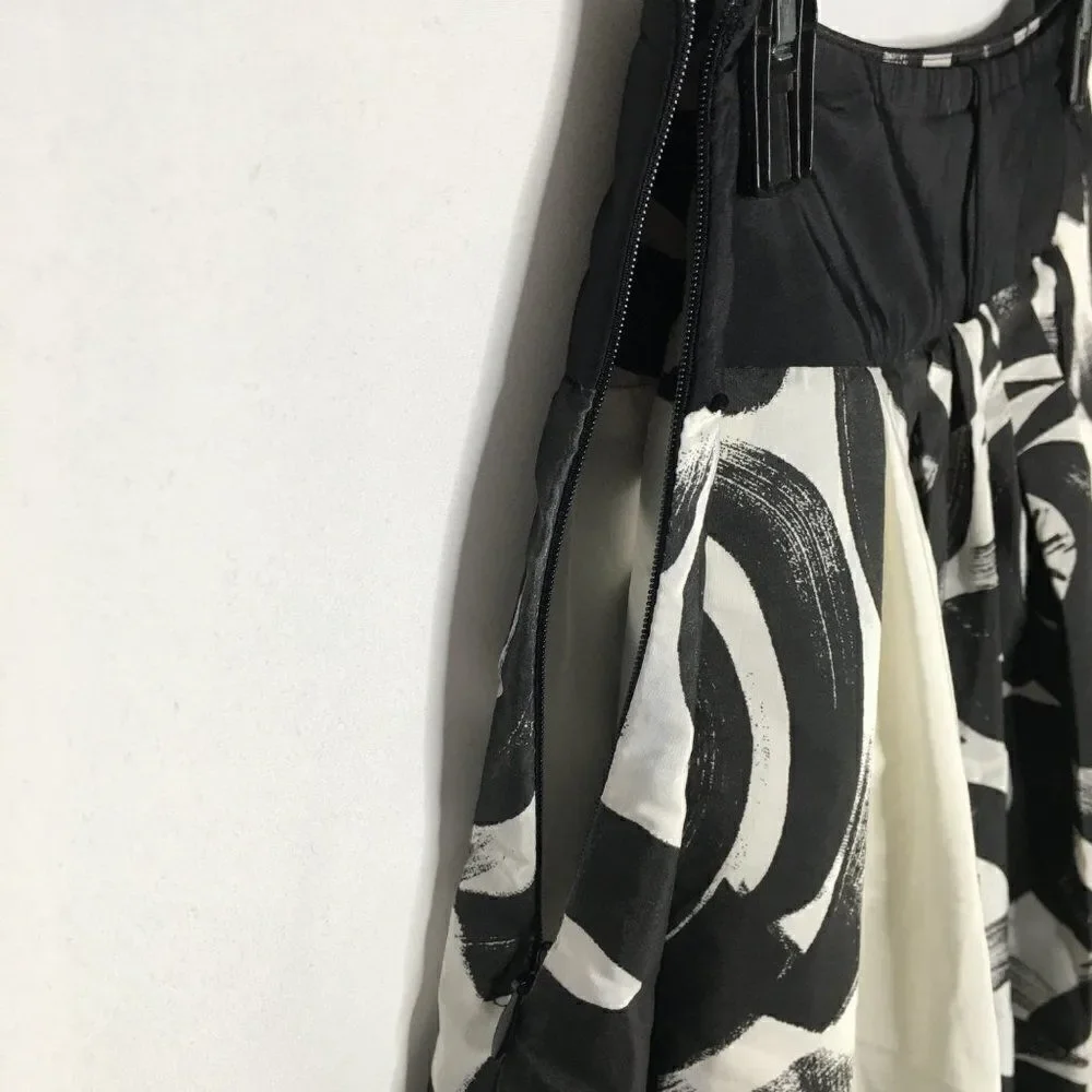 Young women black and white silky polyester skirt